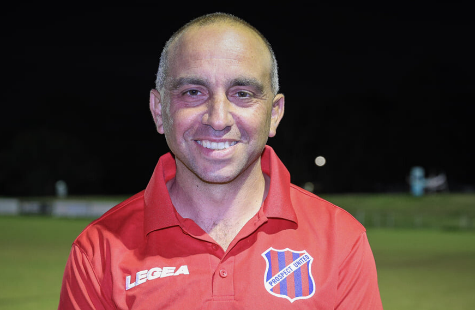 a man smiling for the camera