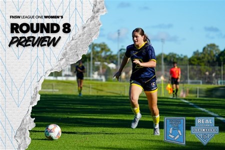 a woman holding a football ball