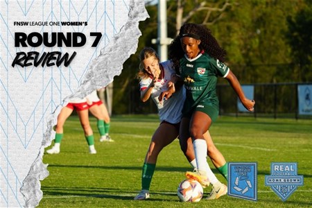 a person holding a football ball on a field