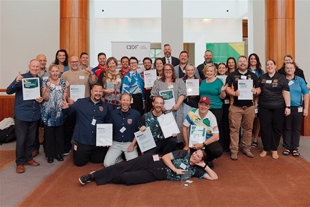a group of people posing for the camera