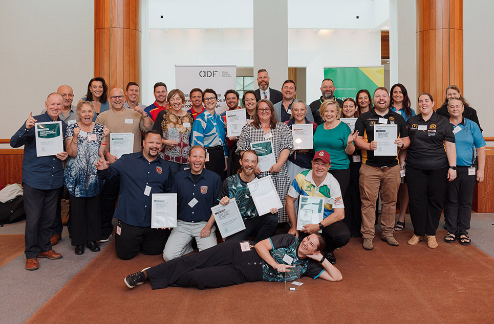 a group of people posing for the camera