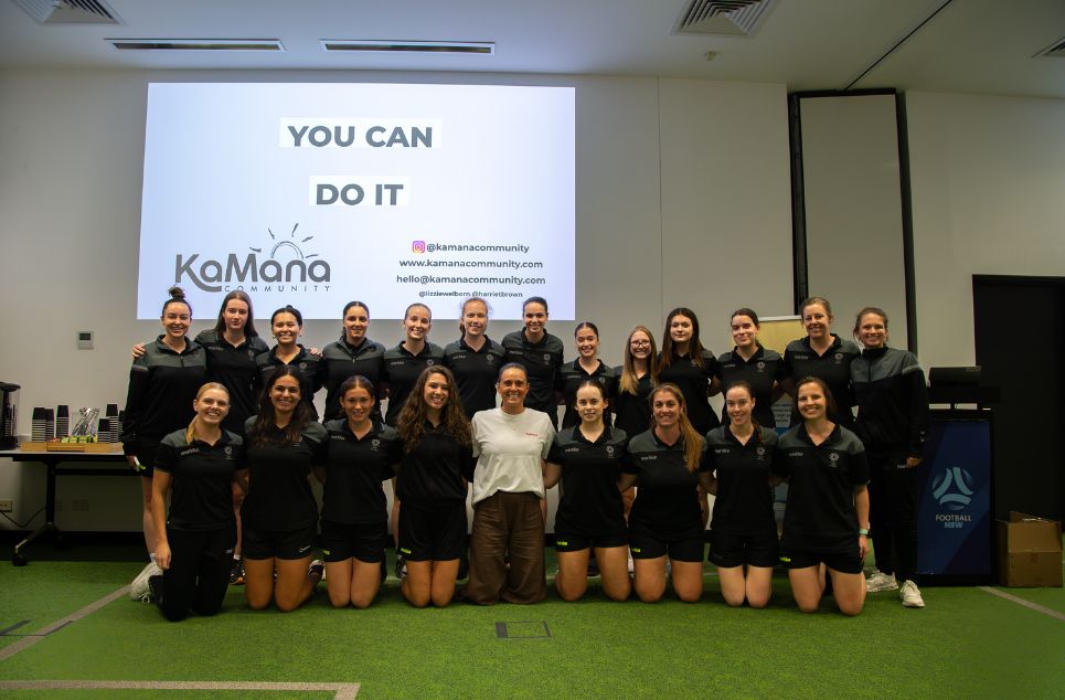 a group of people posing for the camera