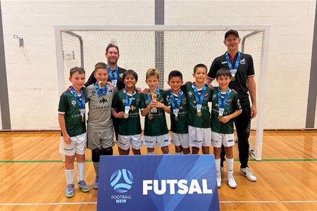 a group of people posing for a picture