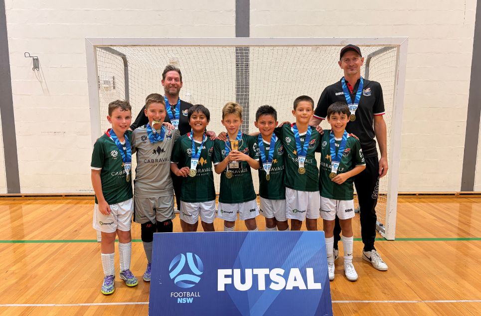 a group of people posing for a picture