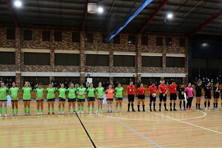 a group of people on a court