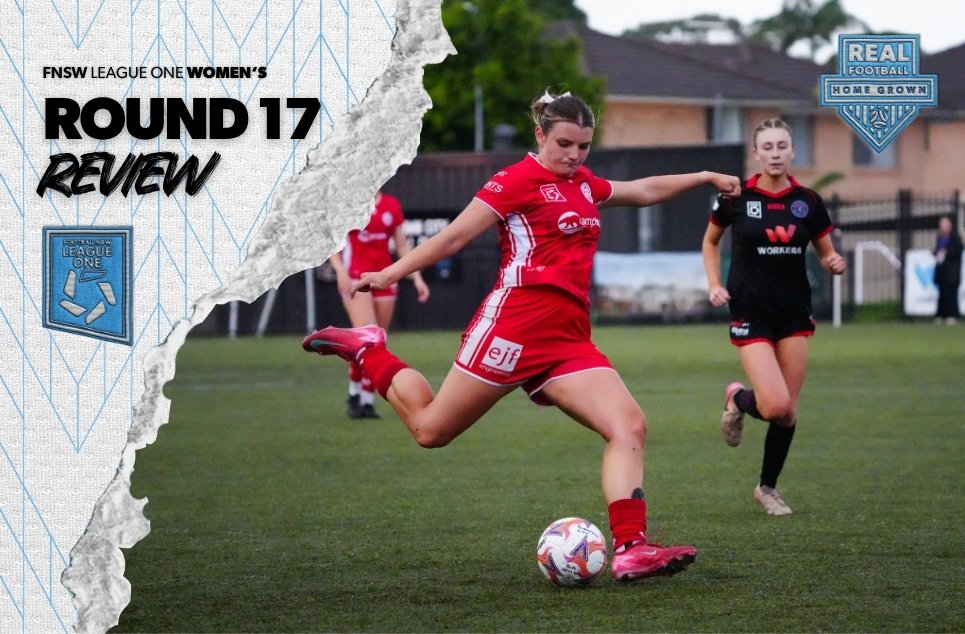 a young girl holding a football ball