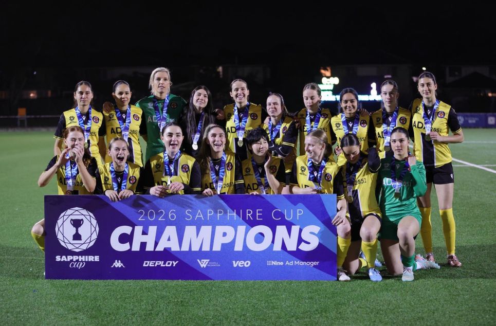 a group of people posing for the camera