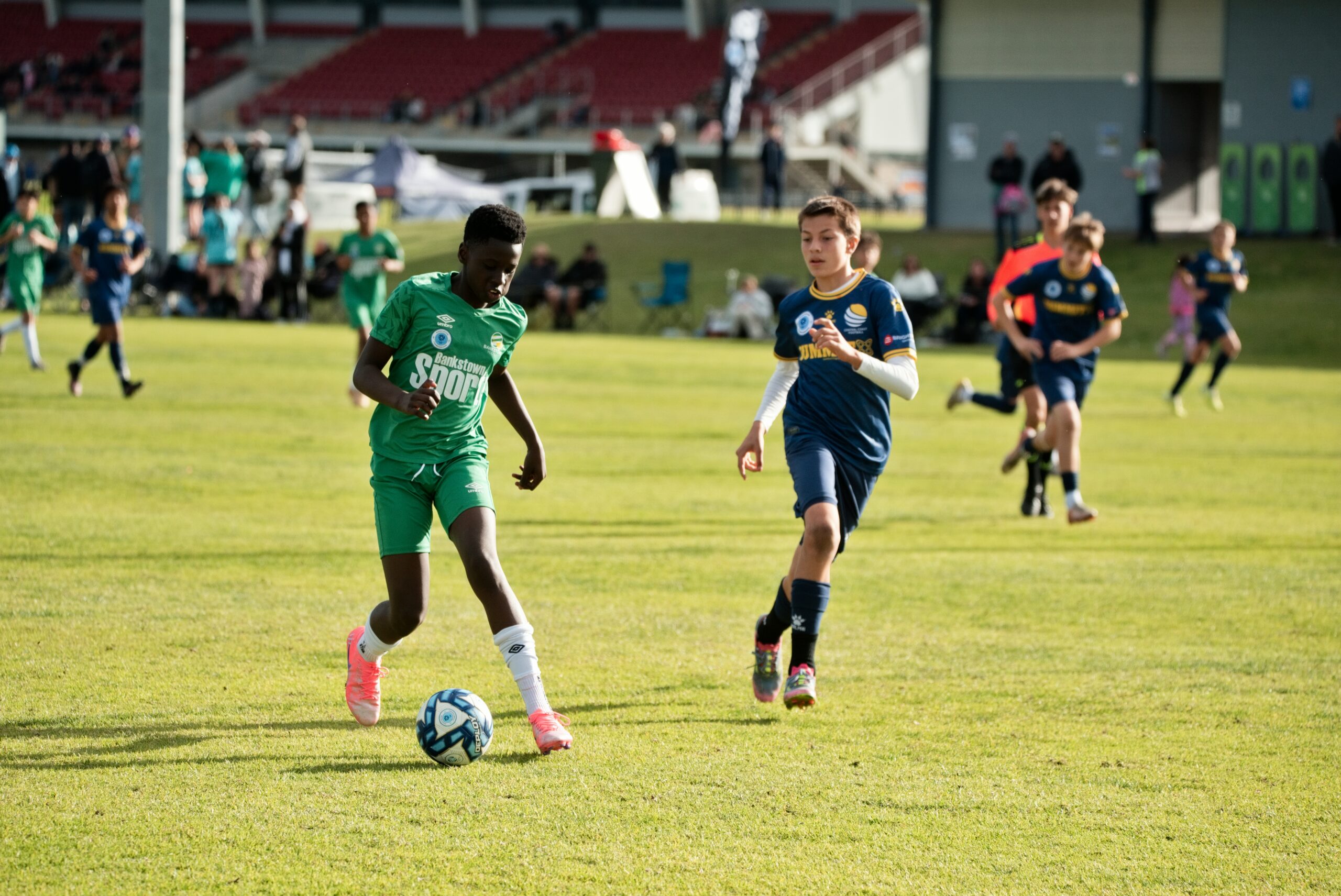a group of young men playing a game of football