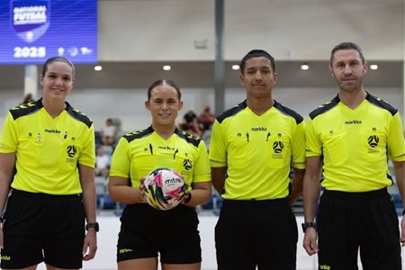 a group of football players posing for a picture