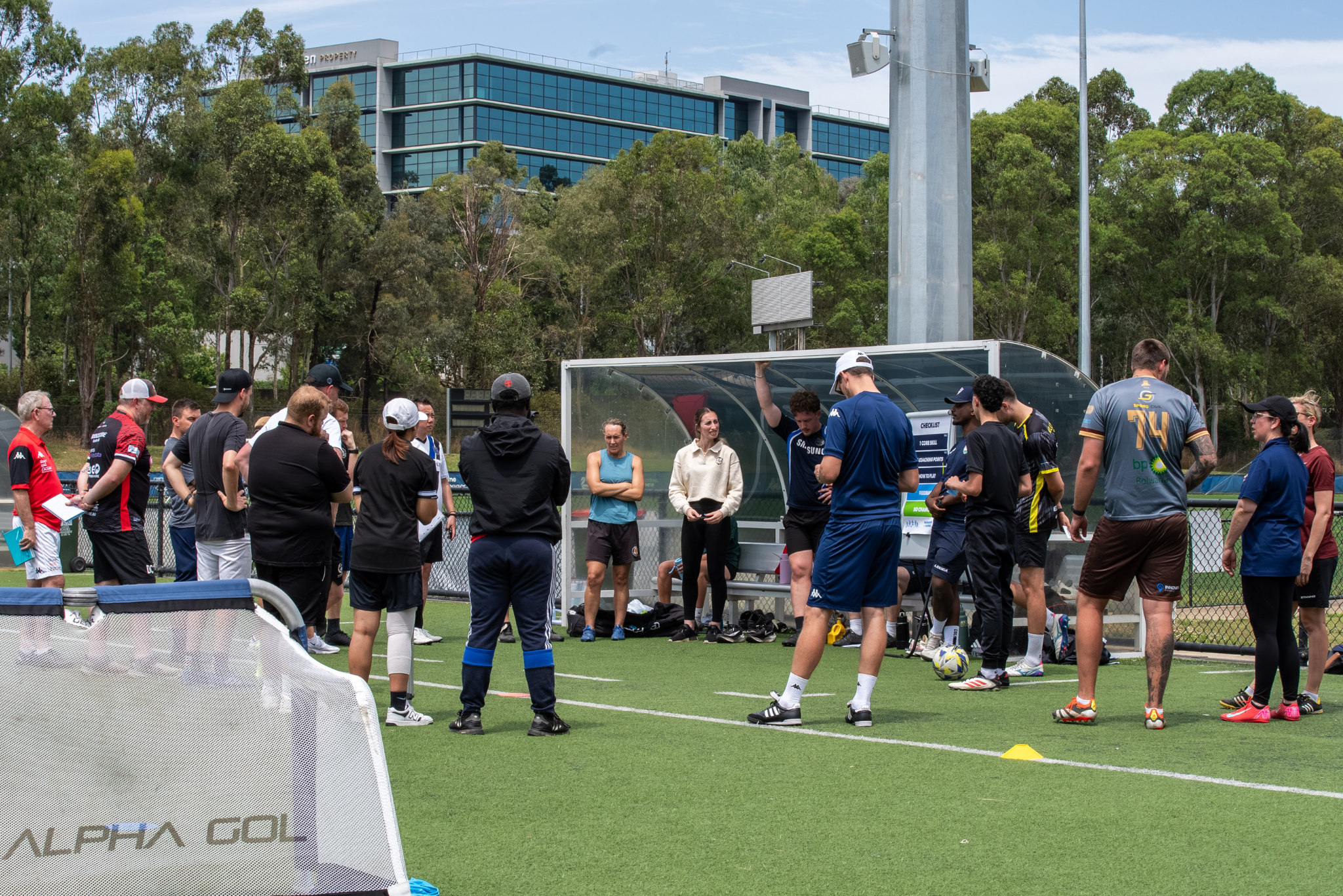 a group of people playing a game of football