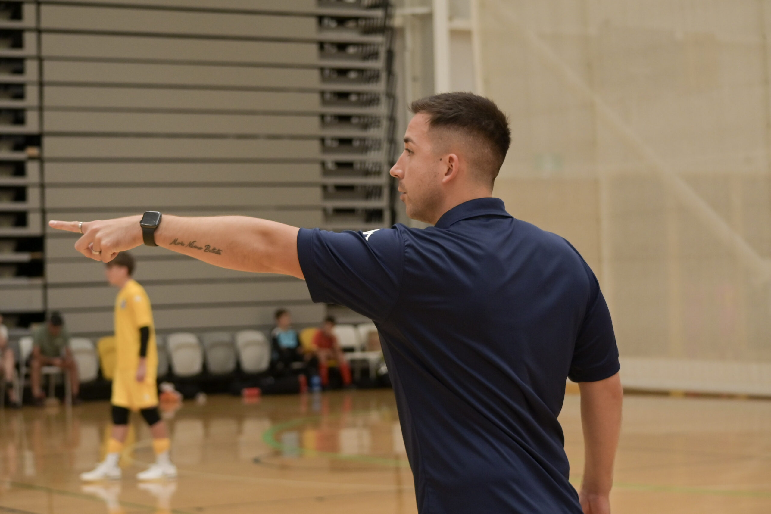 a man standing on a court