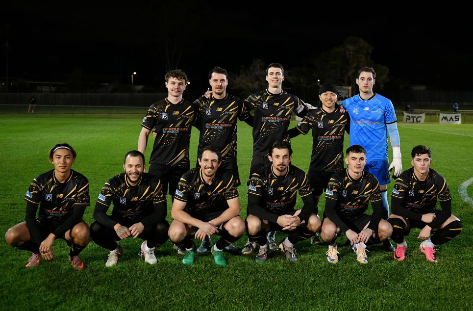 a group of football players posing for a picture