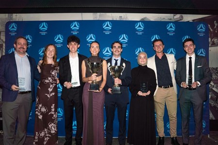 a group of people posing for a photo